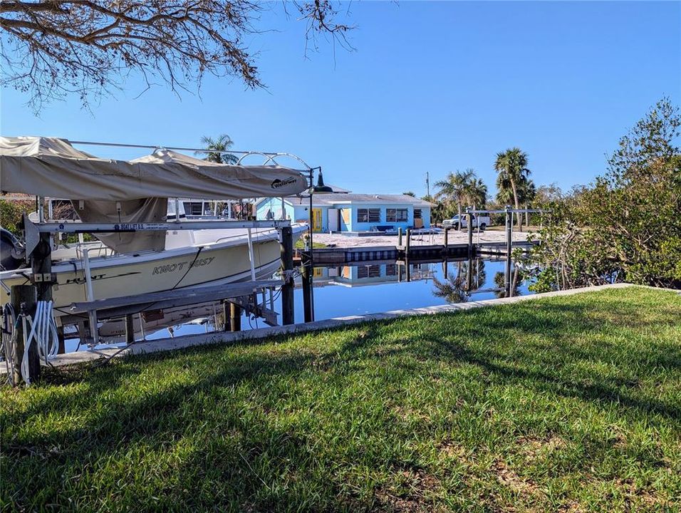 Canal is four homes to Lemon Bay!