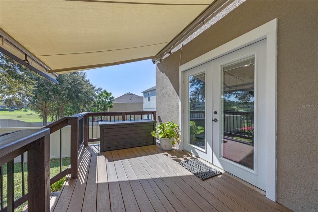 Retractable awning over Trex decking.