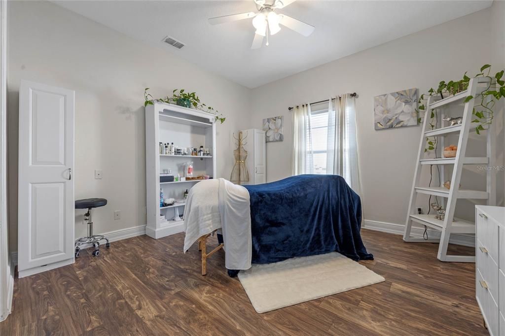 Downstairs bedroom being used as massage office.