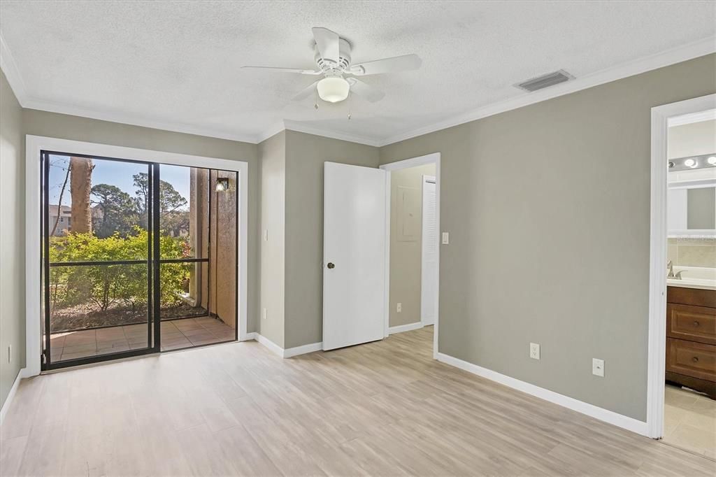 2nd bedroom and glass sliding door to lanai is an ensuite.