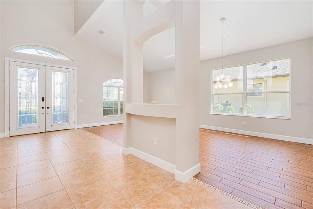 FOYER LOOKING INTO FORMAL DINING ROOM