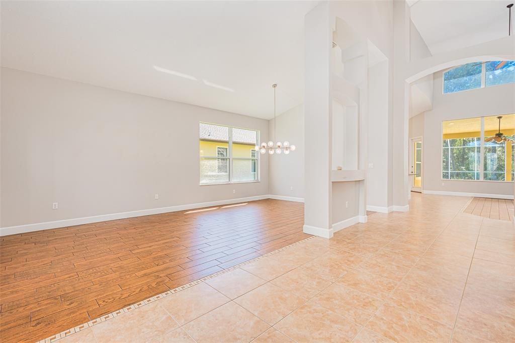 FOYER LOOKING INTO FORMAL DINING ROOM