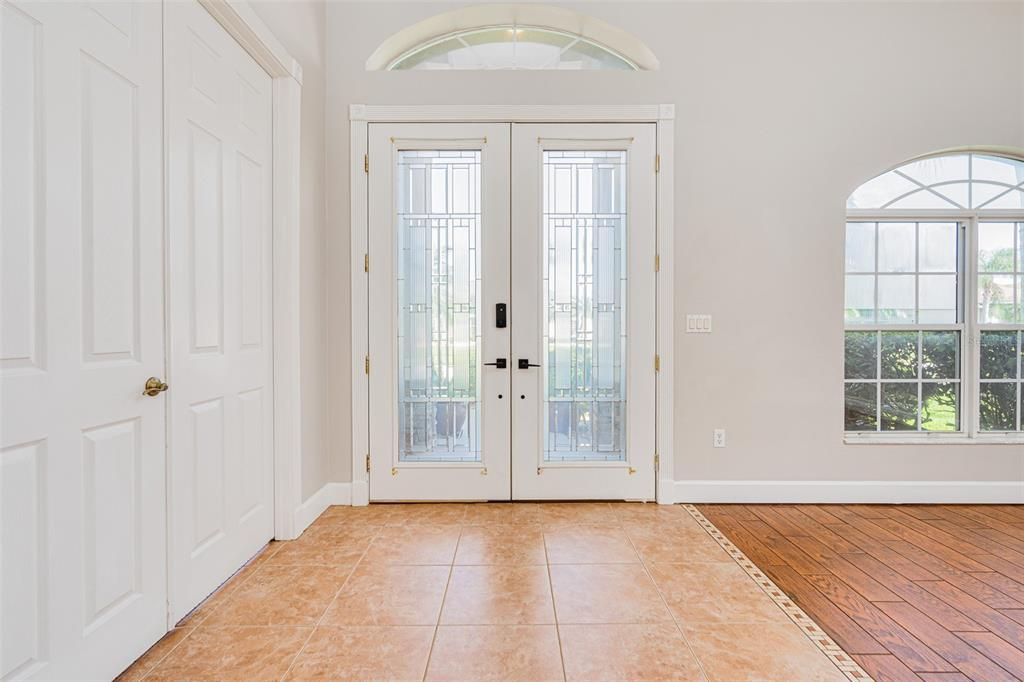 INTERIOR VIEW OF FRONT DOOR AND FOYER