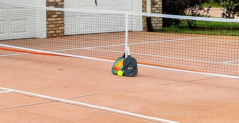 Home comes with portable pickleball net