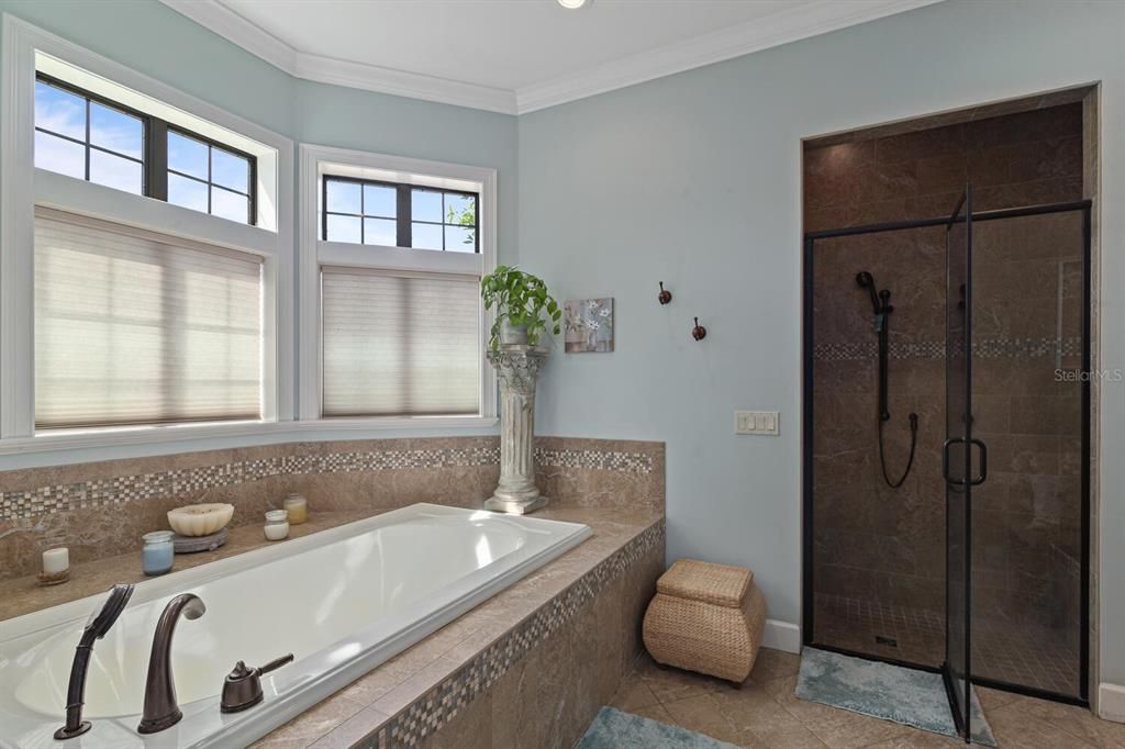 Primary Bathroom With Separate Shower and Soaking Tub