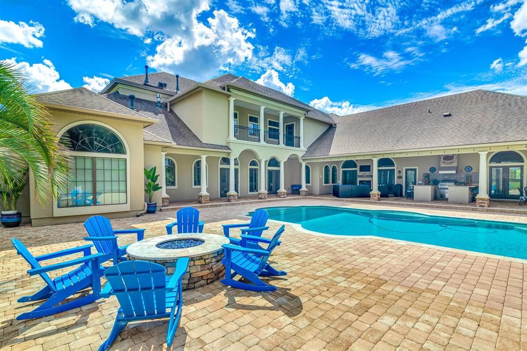 Amazing Pool Lanai With Paver and Travertine Patio