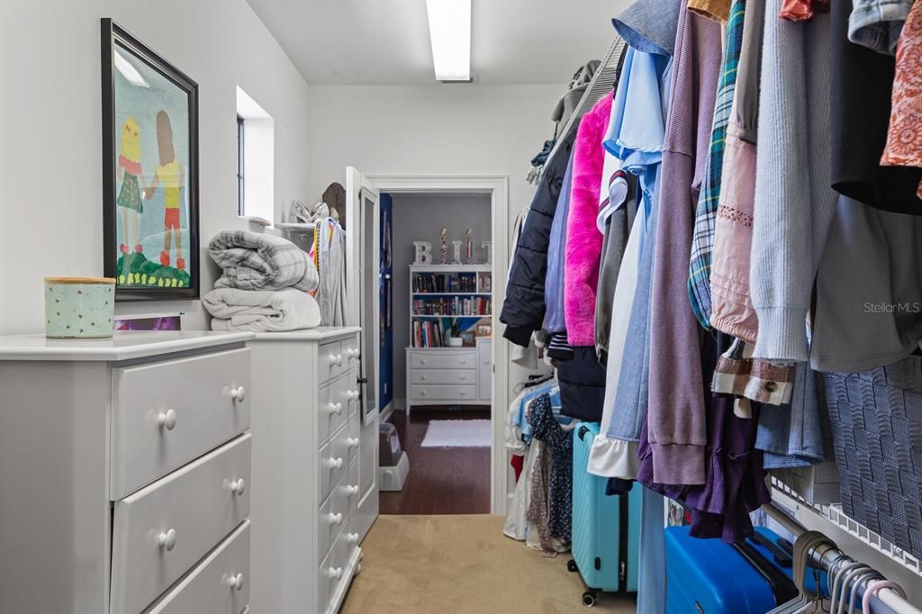 Walk In Closet Connecting Bedroom Two and Three