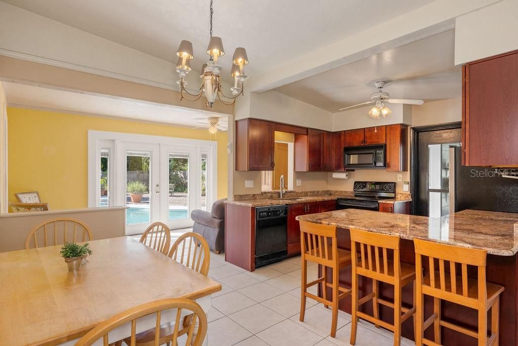 Kitchen features Granite countertops with Breakfast bar