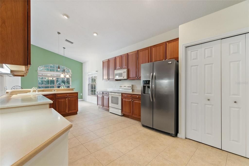 Vaulted ceiling, pantry and built-in desk