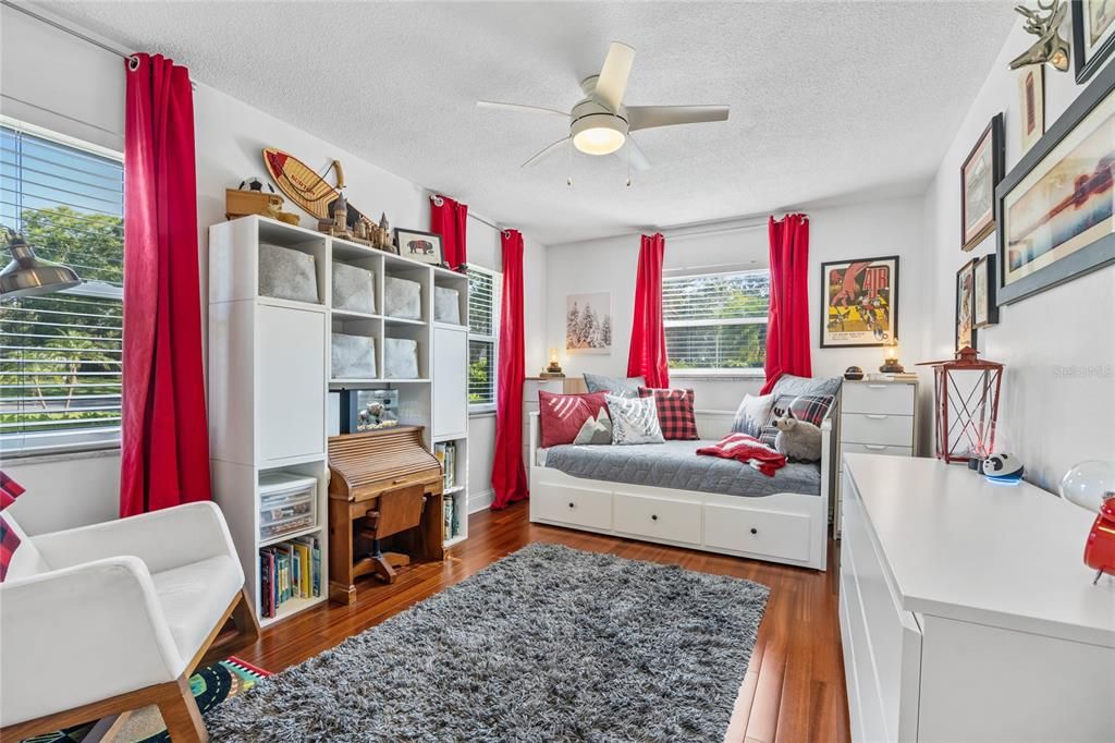 Guest Bedroom #2 is so light and bright with its 3 windows!