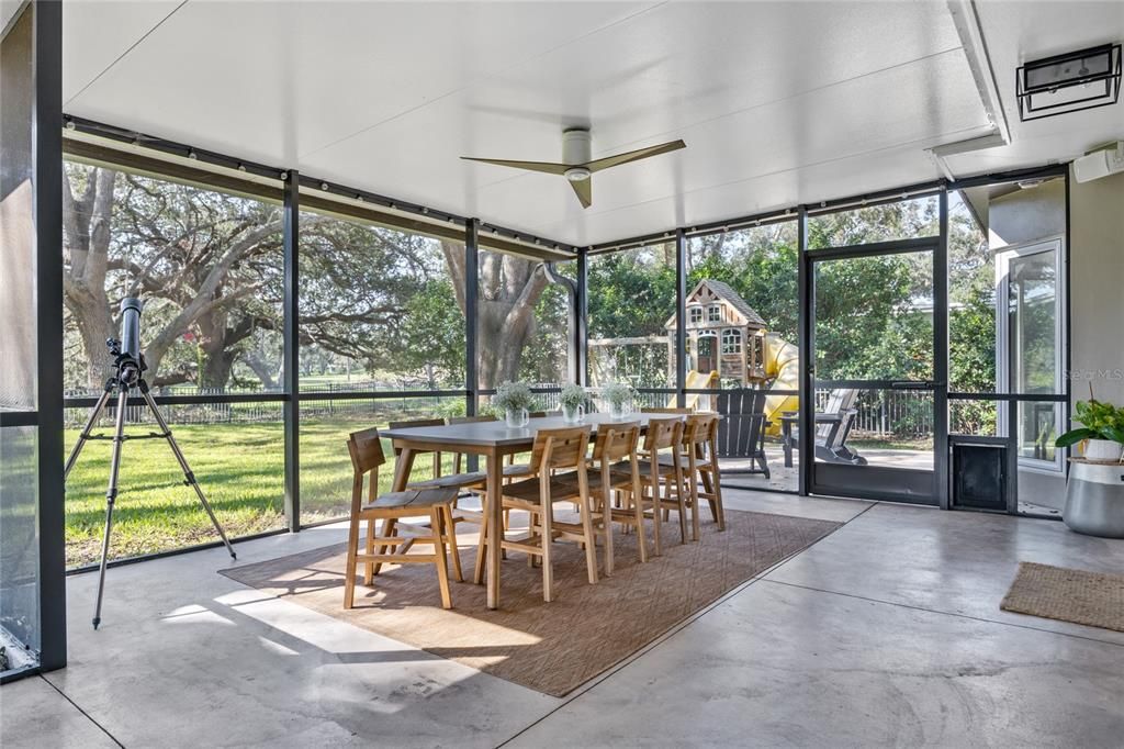 The Lanai has enough room for a large dining table and separate lounge area.