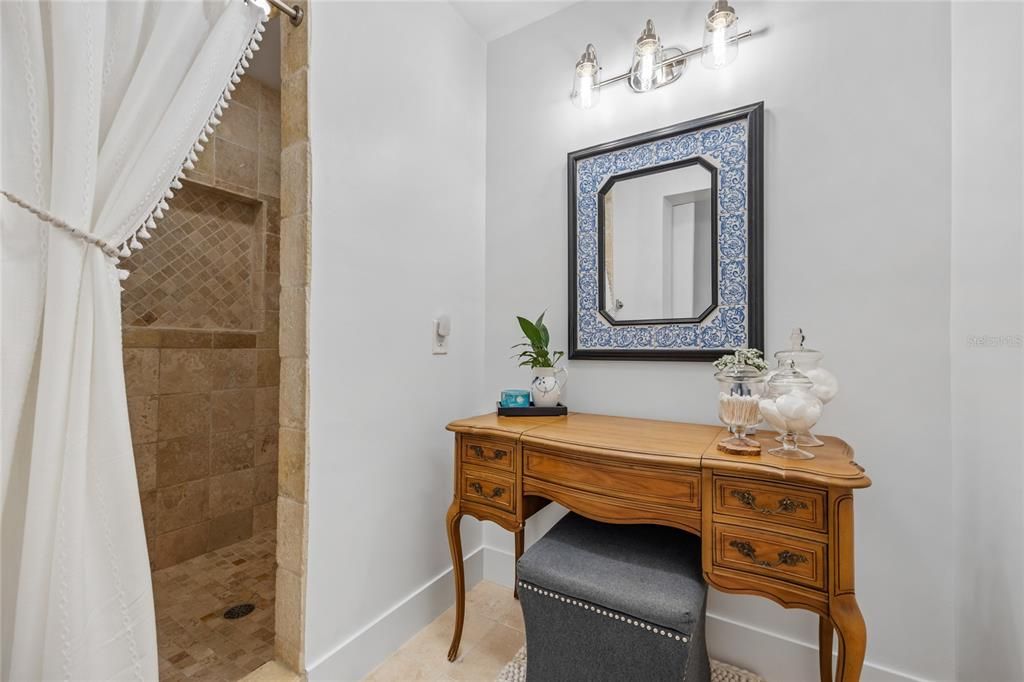 The Primary Bathroom has a gorgeous Tiled Shower and separate Makeup/Vanity area.