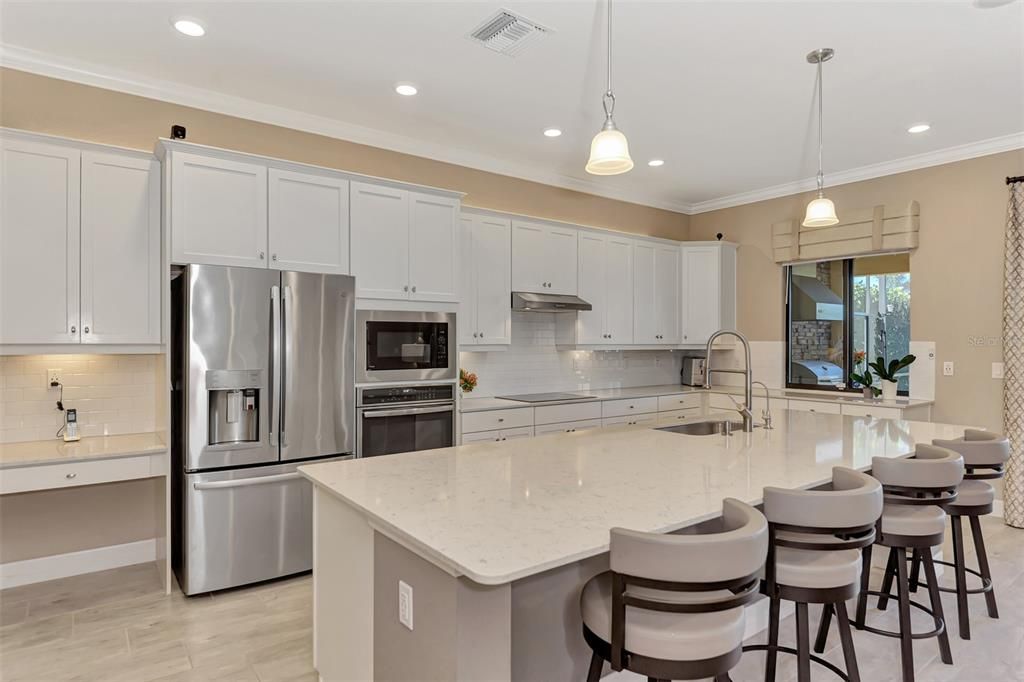 Kitchens have to be a favorite in these homes - large 12' islands - this is all quartz - for the baker or chef in your family