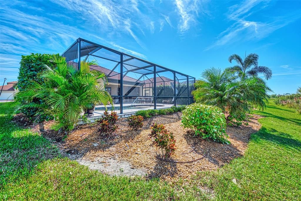 The pool overlooks the lake behind Gallberry.  Beautiful landscape and lighting really makes this home enjoyable at all times of the day.