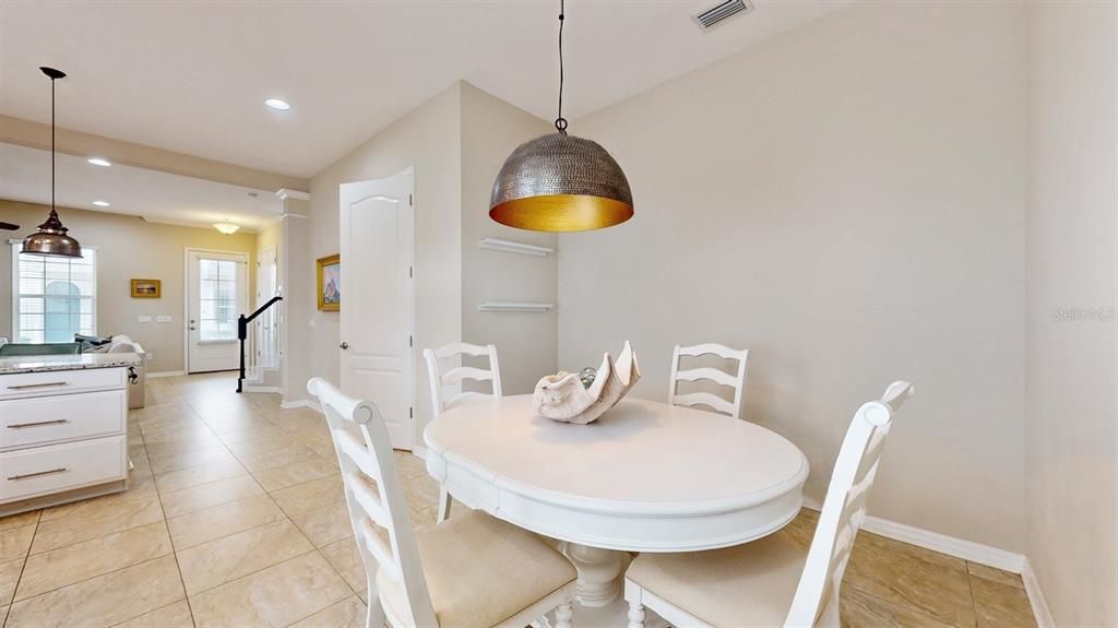 Private Dining Room View to Front Door and Guest Bathroom on the right.