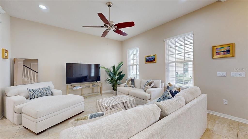 Spacious Living Room with Ceiling Fan.