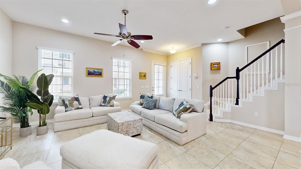 Front Door entrance with oversized coat closet to Open Floor Plan Living.