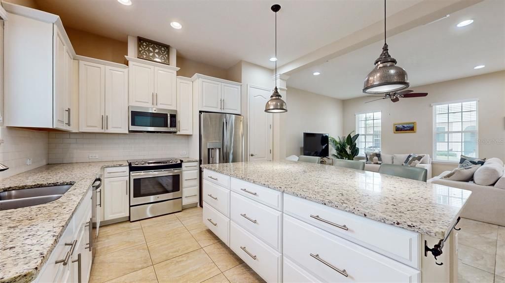 Eat In Kitchen with Floor to Ceiling Built-in Pantry.