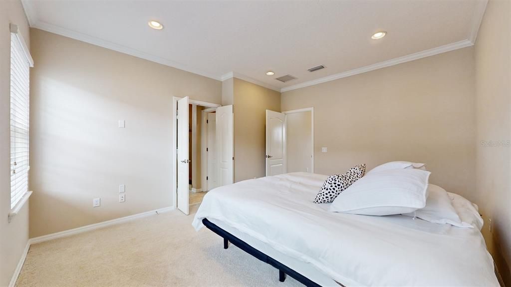 Primary Bedroom with Double Door access to private Bath with large Walk-In Closet.