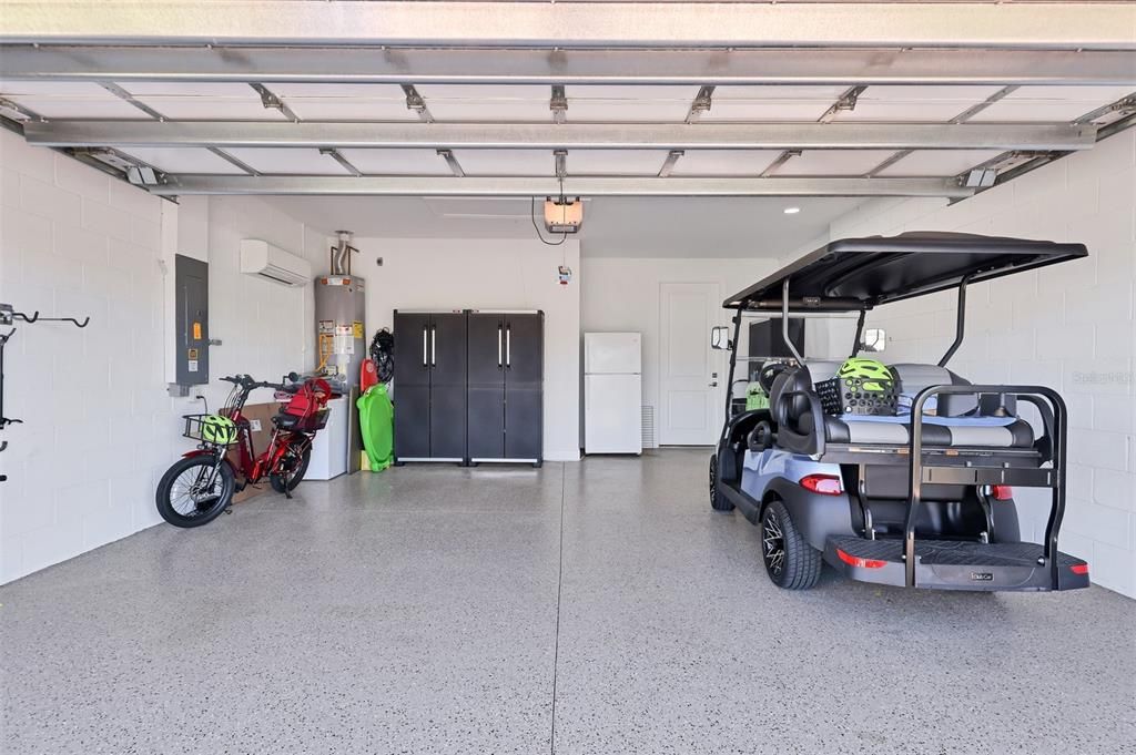 Garage with 4' extension, epoxy coated floor and mini split AC installed