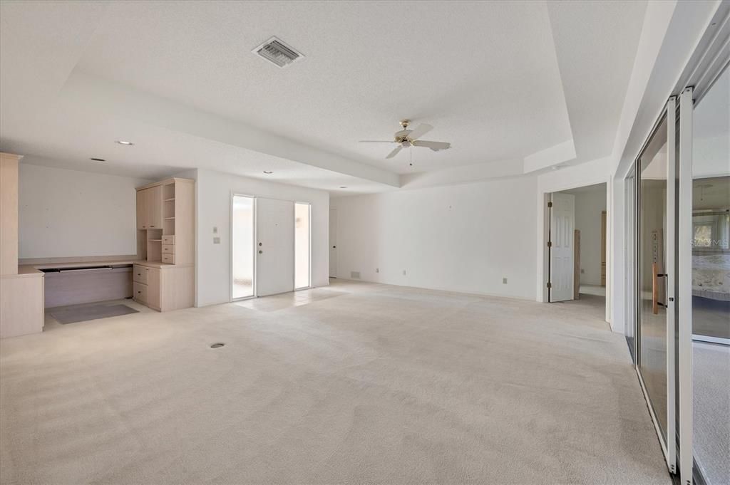 Living room with built-in office alcove.