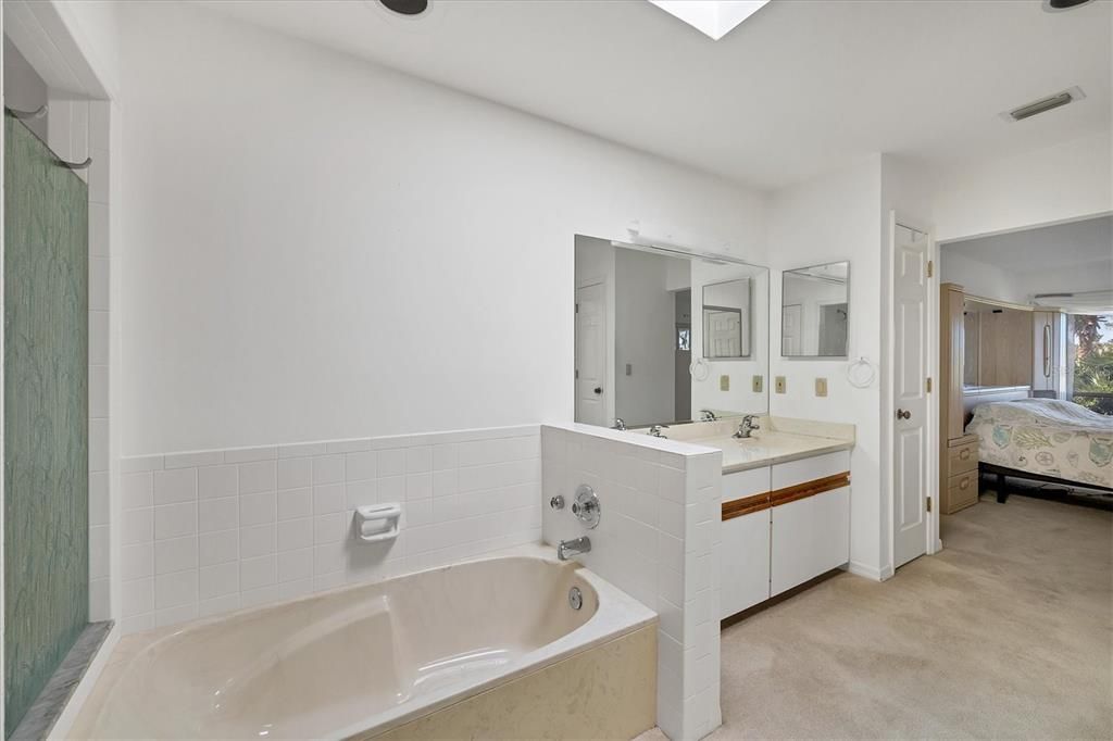 Primary bath has separate tub & shower