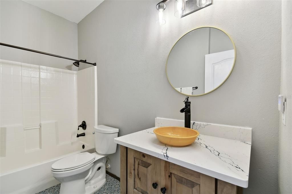 tub shower combo and look at the tile!