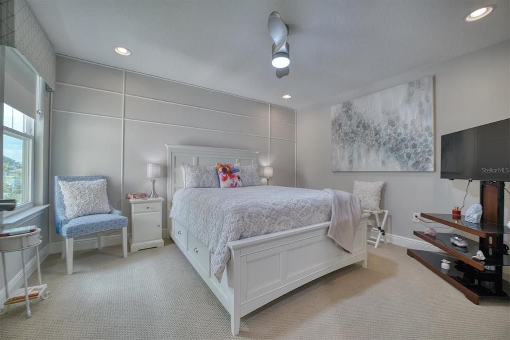 The Guest Room featuring Accent Wall and  Walk in Closet