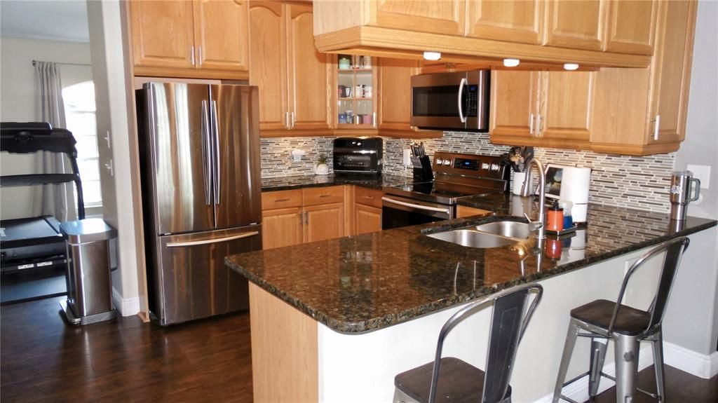 View of kitchen with stainless appliances