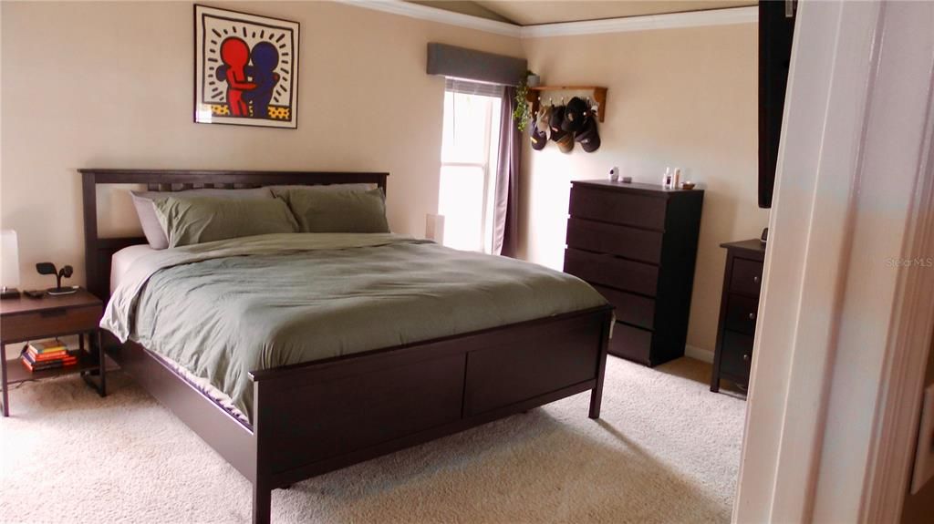 Primary bedroom with lots of natural light