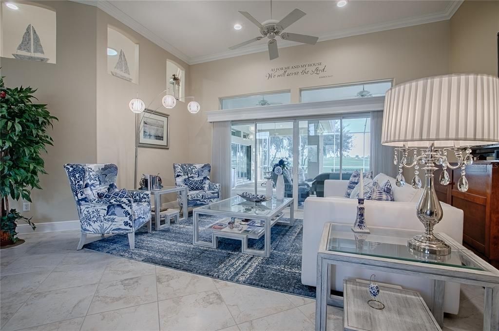 Fabulous living room with views of lanai in pool area