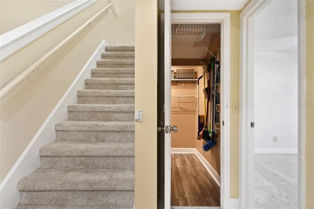 As you ascend the stairs to the right is a finished storage closet under the staircase. Great for storing cleaning equipment, holiday items and those staple items bought in bulk.