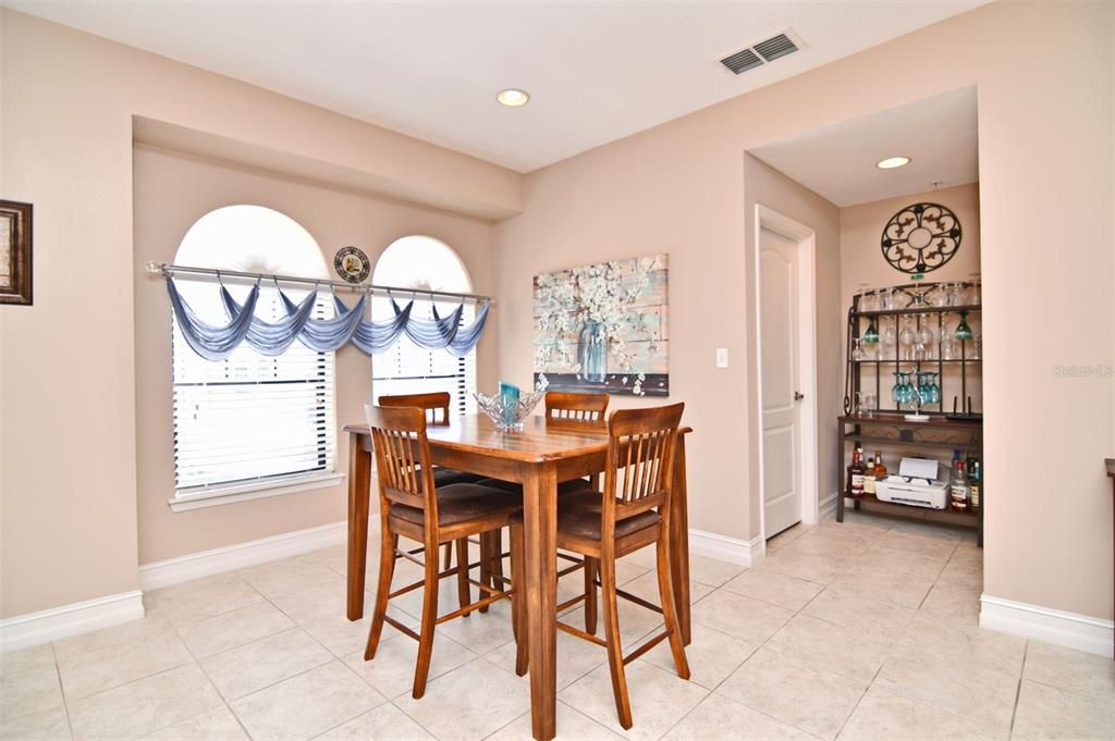 Spacious kitchen will accommodate your table and the nook offers a space for your wine rack if you like.  Big windows offer natural light.