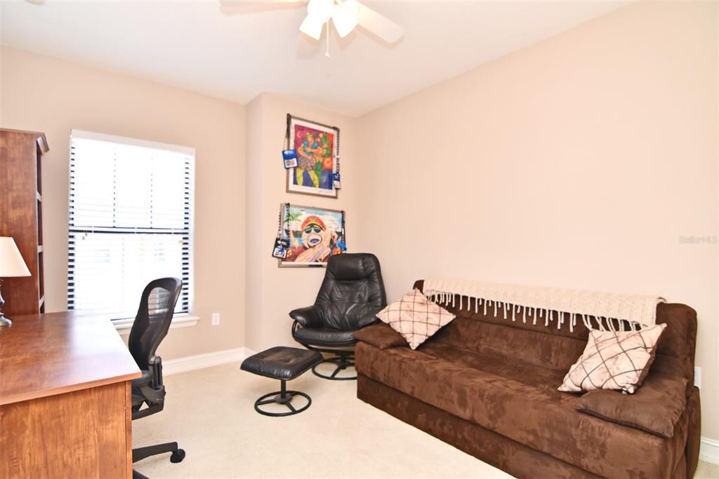 This bedroom is being used as a home office currently.