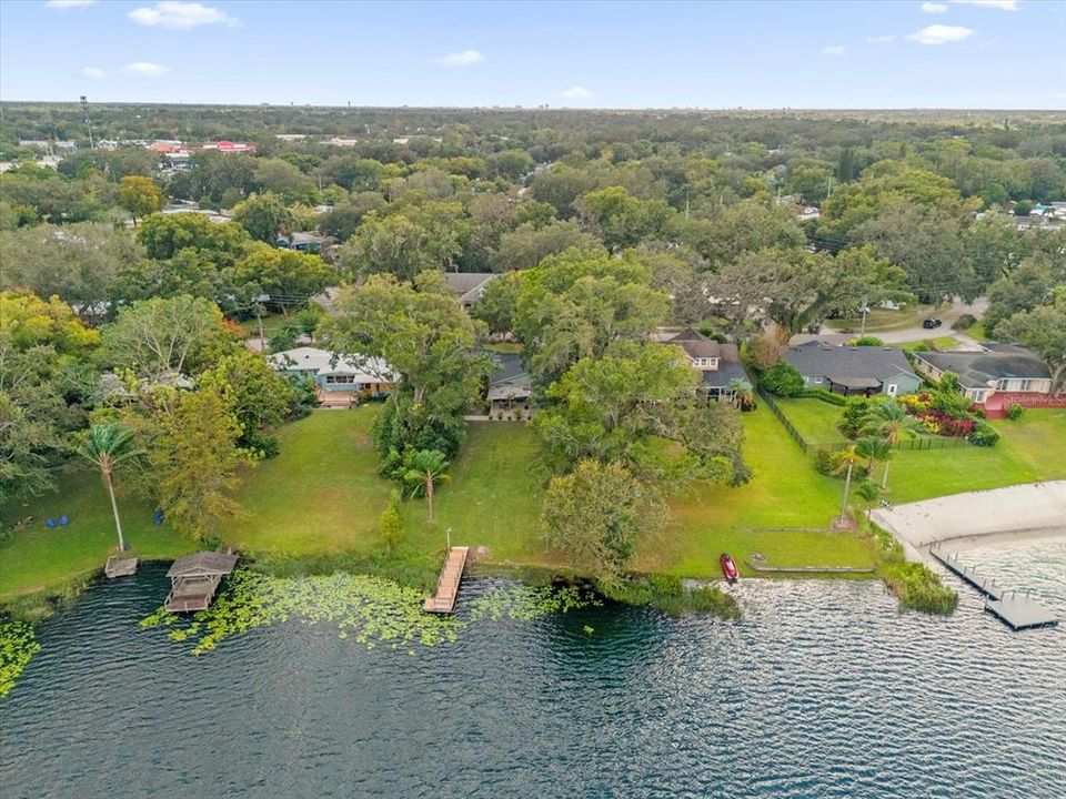 Situated on almost 1 acre on SKIABLE LAKE ARNOLD!