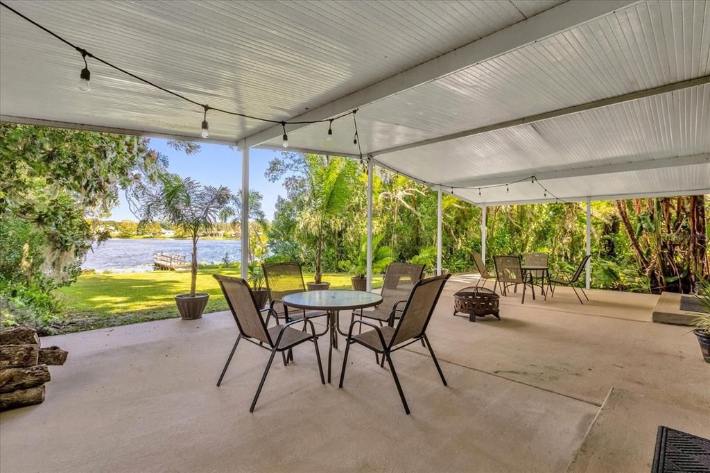 Large rear covered porch with views of Lake Arnold