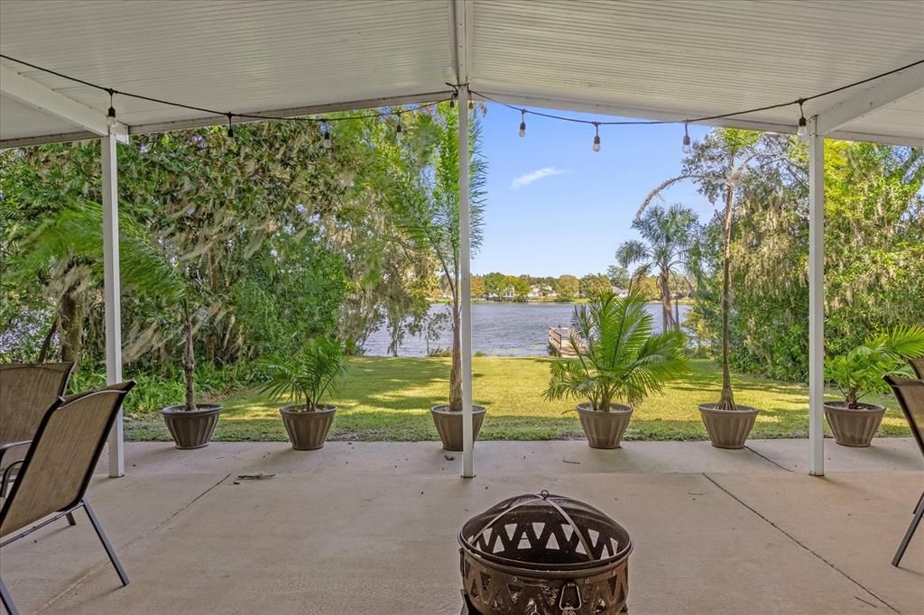 Large rear covered porch with views of Lake Arnold