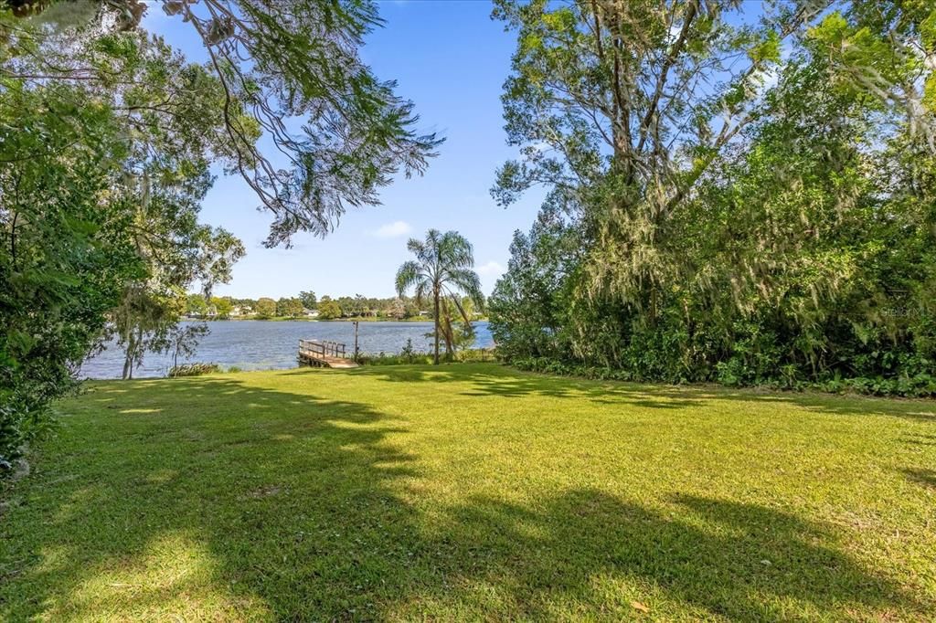 Expansive backyard on skiable Lake Arnold