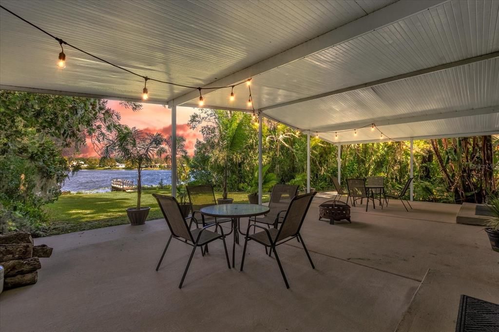 Large rear covered porch with views of Lake Arnold