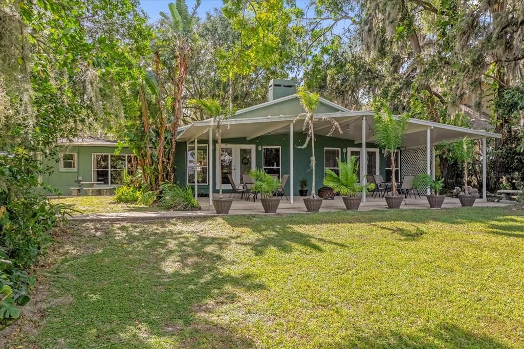 Large rear covered porch with views of Lake Arnold