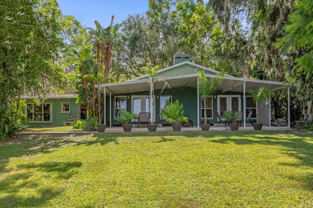 Large rear covered porch with views of Lake Arnold