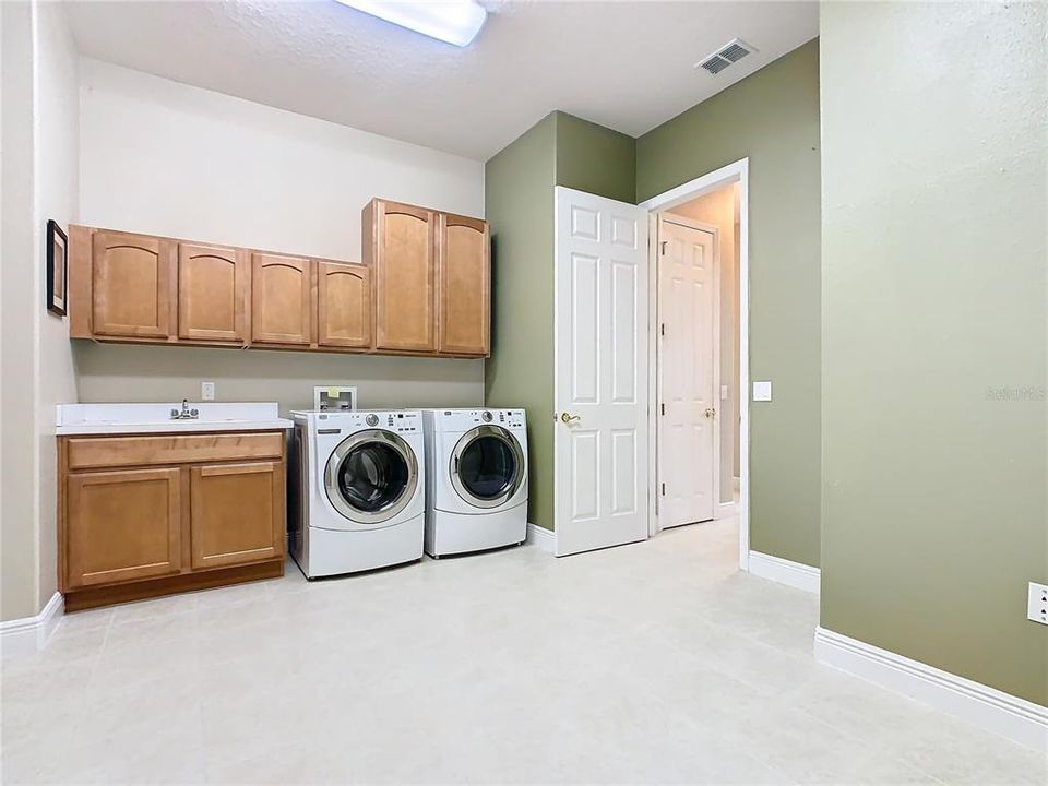 Large Laundry Room with Storage