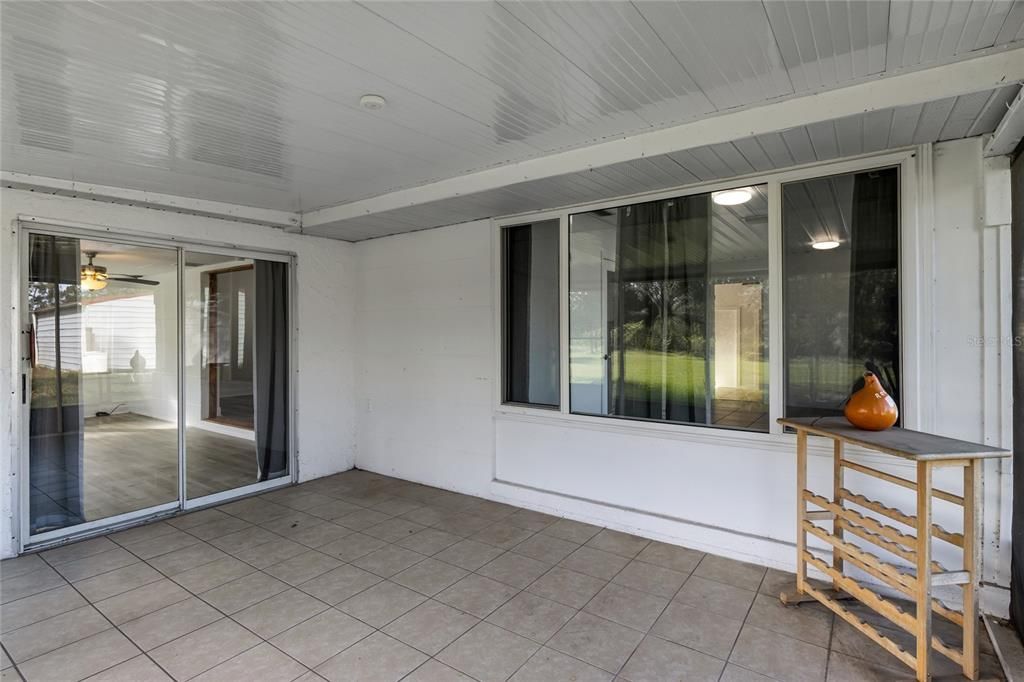 Screened Lanai features tile flooring