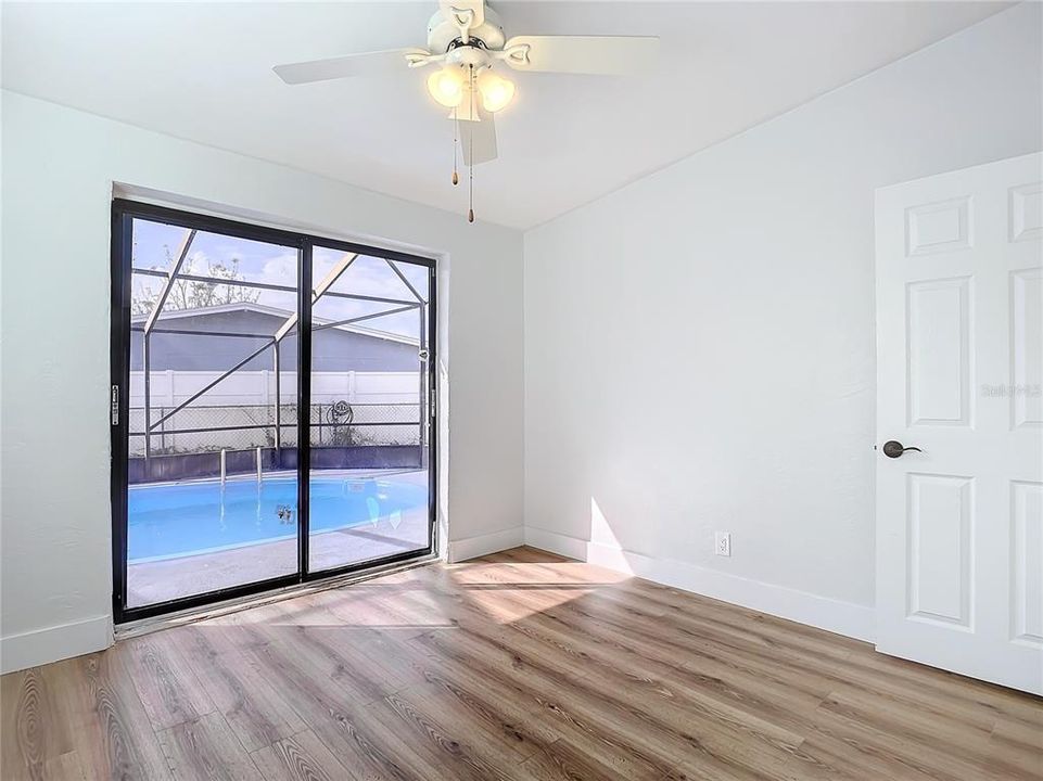 third bedroom has sliding doors to pool