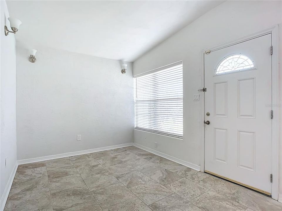 tile floor throughout the home except for bedrooms