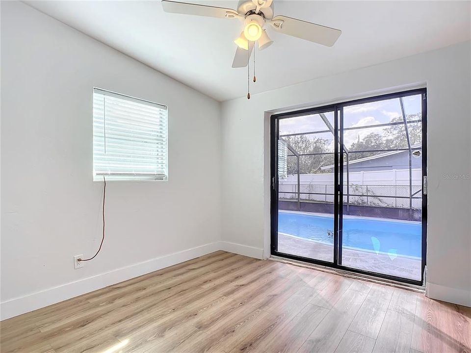 third bedroom sliding doors to the pool