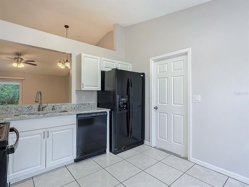 Kitchen view towards garage