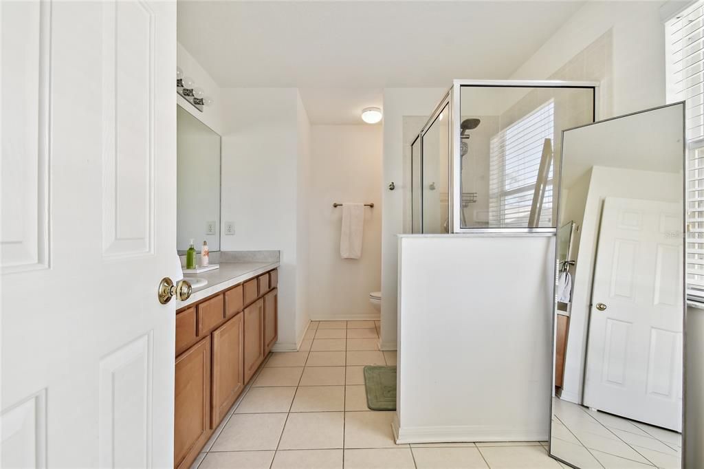 large primary bath with dressing area