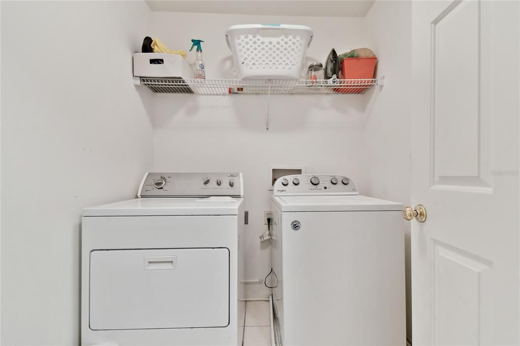 laundry room with shelving