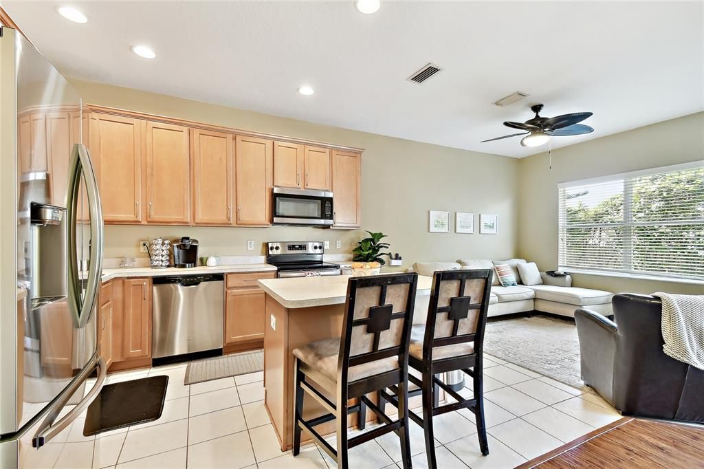 kitchen family room combo with a nature view